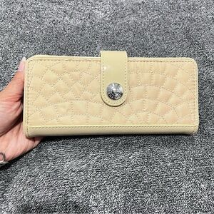 Vera Bradley quilted tab wallet in a tan/beige color NWOT
